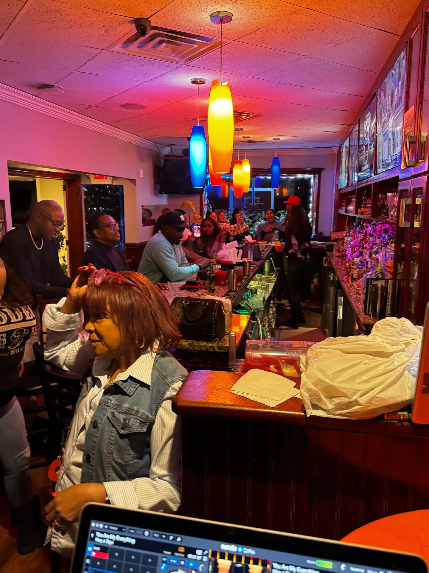 An evening gathering around the Spices Negril lounge bar
