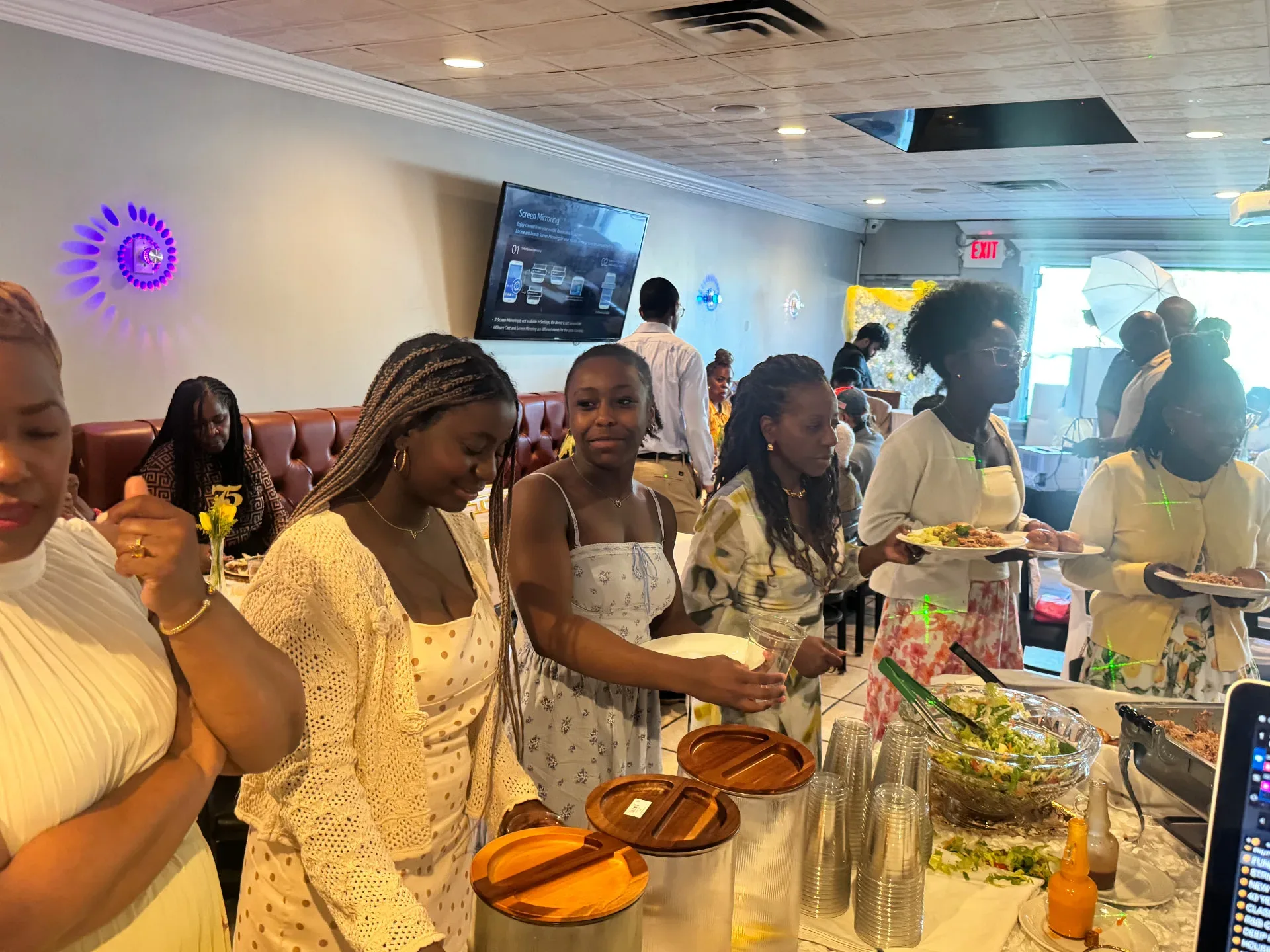 Guests enjoying the buffet during a gathering at Spices Negril